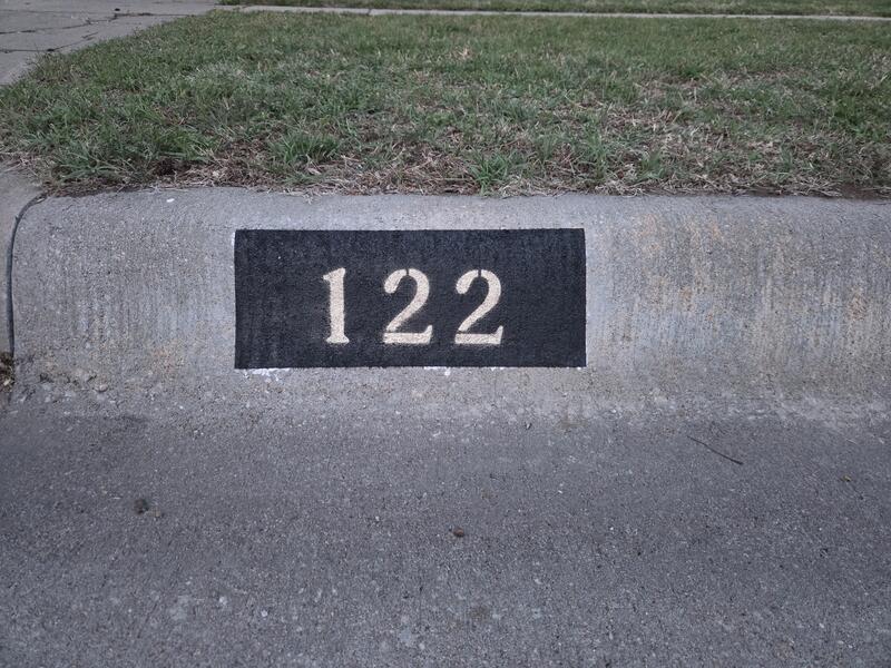 Curb Painting job in Newton, KS