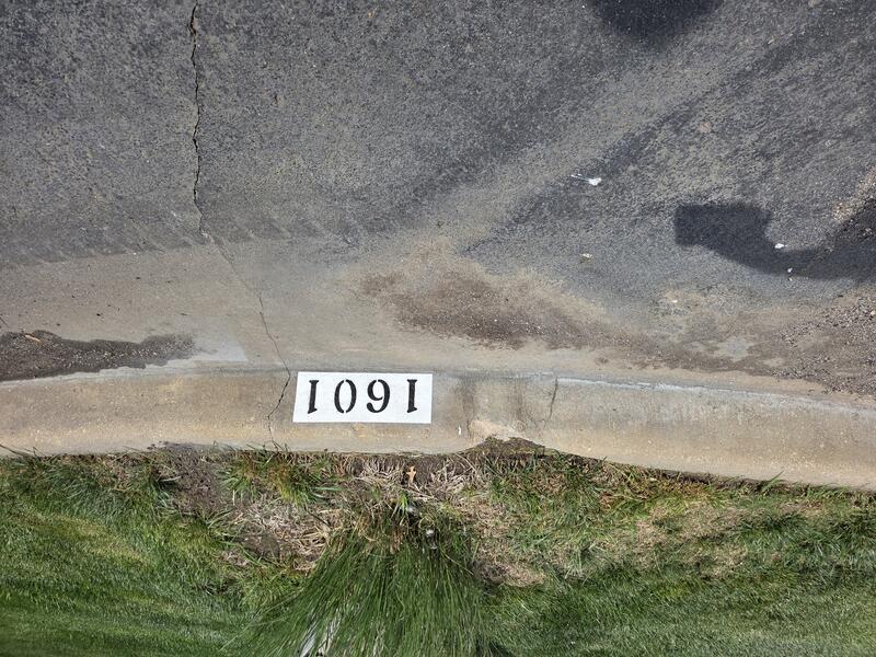 Curb Painting job in Newton, KS