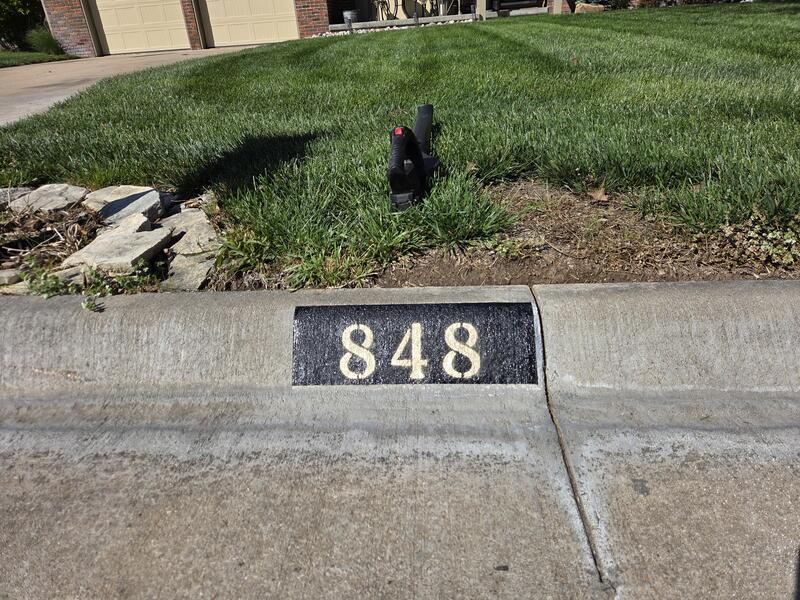 Curb Painting job in Newton, KS