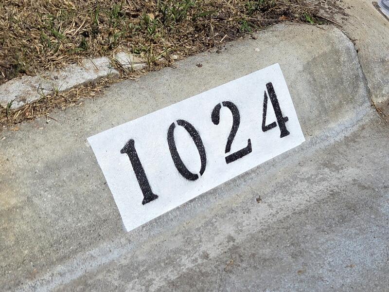 Curb Painting job in Newton, KS